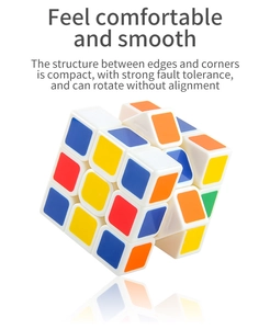 Close-up of a 3x3 educational puzzle cube with colorful tiles and white plastic base