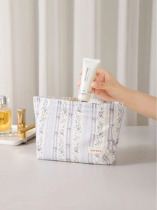 Purple floral makeup bag with high capacity and delicate bow decoration for travel storage