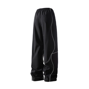 Women's black casual wide-leg trousers with contrast side stripe and elastic waist