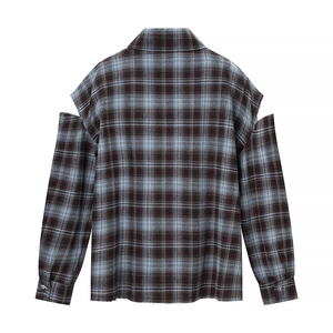 Back view of a casual plaid shirt with stylish cut-out shoulders in blue and black