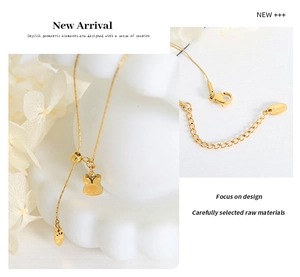 Detail of gold rabbit pendant necklace in stainless steel showing clasp and s.steel hallmark