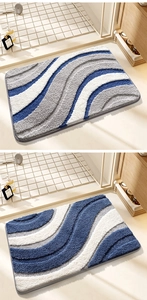 Detail showing the plush texture of a rainbow wavy patterns non-slip bathroom bath mat
