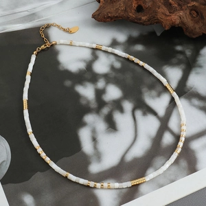 Minimalist brass gold plated necklace with white square shell beads and lobster clasp