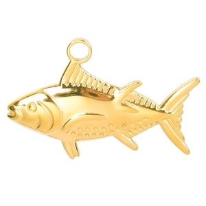 Macro shot of gold fish-shaped pendant with polished 18k plating for DIY jewelry making