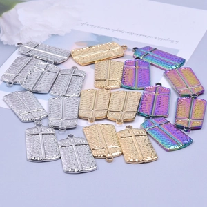 Rainbow plated stainless steel cross pendants with hammered texture in multiple colors