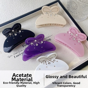 Macro detail of high-quality acetate hair claws with sparkling rhinestones in five colors