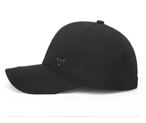 Detail view of black padded baseball cap featuring quilted texture and side metal logo