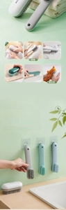 Close-up of ecoco soft bristle shoe brushes with hanging holes in multiple colors