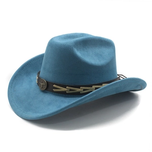 Detailed close-up of blue suede cowboy hat with vintage bronze bull head emblem