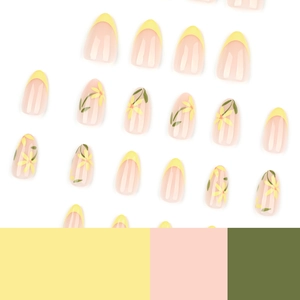 Faux ongles French jaunes amande avec motifs floraux minimalistes et finition brillante