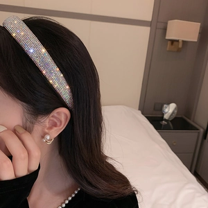 Sparkling rhinestone headband for women featuring colorful crystals in a stylish design
