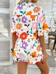 Rear view of woman in bohemian floral print set with short-sleeve shirt and shorts