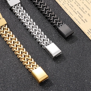 Close-up of hip hop woven stainless steel bracelets in gold silver and black finishes