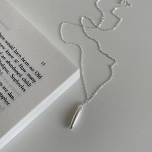 Minimalist S925 sterling silver necklace with polished double-pointed spindle pendant