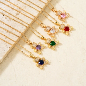 Golden necklace with heart stones and zircon teddy bear pendants in six vibrant colors