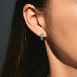 S925 silver double row pave diamond hoop earrings worn on female model's ear