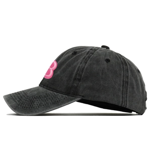Washed dark grey cotton baseball cap with pink embroidered letter B on the side