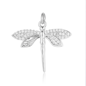 Detailed view of silver dragonfly pendant with zircon inlay and hollow textured wings