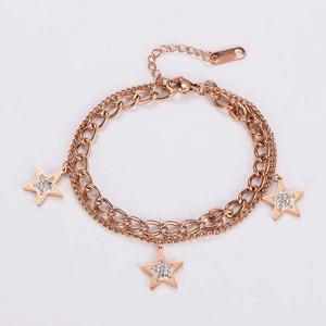 Detail view of double-layer rose gold star bracelet with inlaid sparkling zircons