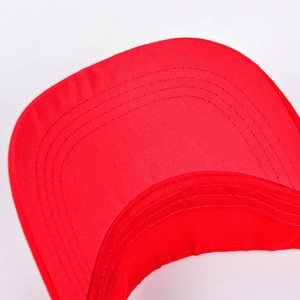 Close-up of vibrant red cotton sun hat brim with detailed six-row reinforced stitching