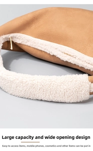 Close-up of khaki pebbled leather shoulder bag with white faux fur trim and wide opening