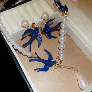 Blue enamel swallow pearl jewelry set with necklace and drop earrings in vintage style