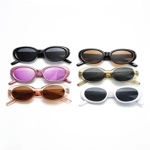 Retro oval sunglasses in various colors like black, pink, and tortoiseshell for Y2K street style
