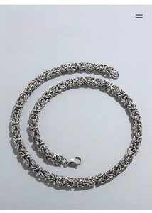 Detail of silver men's Byzantine chain necklace with rust-proof and scratch-resistant features