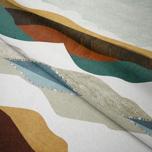 Detail shot of the soft short-pile fabric texture on a mountain pattern tapestry