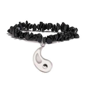 Handmade bracelet with natural black irregular stones and Yin Yang teardrop pendant
