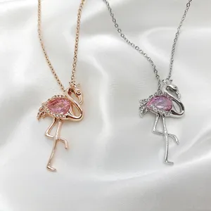 Flamingo pendant necklace with pink teardrop stone in rose gold and silver finishes