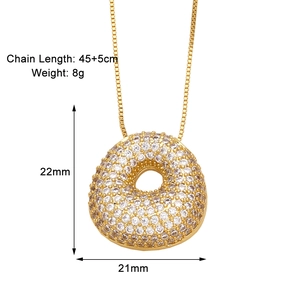 Detail view of gold zircon necklace with dimensions 21x22mm and 45+5cm chain length