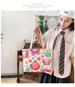Ethnic floral tote bag with colorful butterfly prints and durable canvas shoulder strap