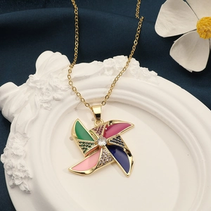 Women's copper necklace featuring a colorful zircon bear windmill pendant in gold finish