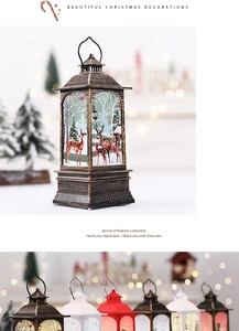 Close-up of vintage Christmas lanterns with reindeer prints and warm LED flame effect