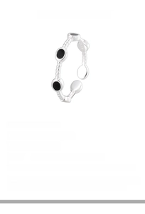Detail view of S925 sterling silver twist ring with black enamel dots and size specifications