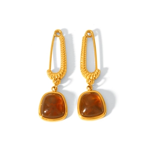 French vintage 18k gold plated paperclip earrings with amber stone on white background