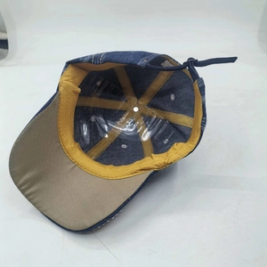 Adjustable denim baseball cap with sweatband and khaki lining shown from top interior view