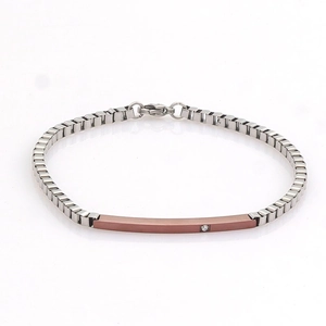 Silver stainless steel Cuban chain bracelet featuring rose gold bar with zircon stone inlay