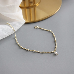 Minimalist S925 sterling silver gold beaded chain bracelet with a white pearl pendant