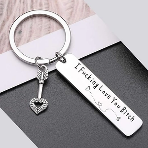 Silver stainless steel keychain with I Fucking Love You Bitch engraved bar and heart arrow