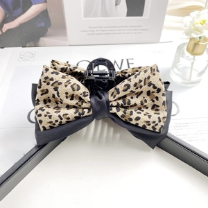 Large leopard print bow hair claw clip for women's elegant updo hair styling