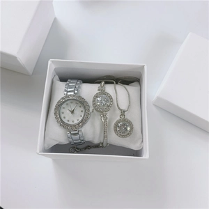 Silver watch and jewelry set with rhinestone inlay in a white gift box for women