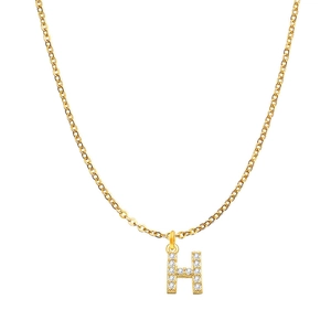Macro detail of gold-plated chain necklace with a crystal-encrusted letter H pendant
