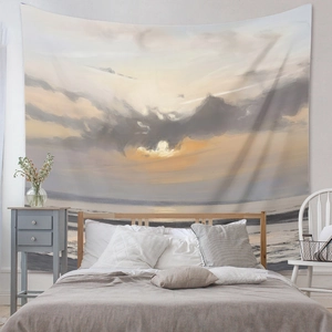 Detail of impressionist sunset landscape wall tapestry in a modern bedroom setting
