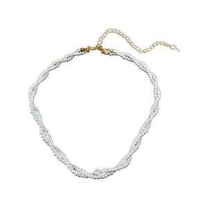 Double-layered twisted pearl choker necklace with a central zircon and golden clasp