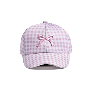 Detailed view of pink plaid texture and 3D bow embroidery on kids baseball cap