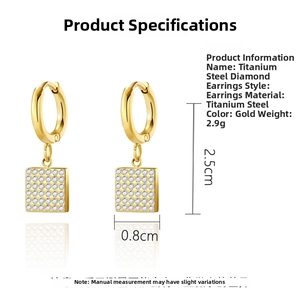 Detail view of gold titanium steel hoop earring with a square pavé-set diamond pendant