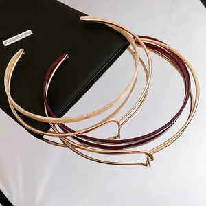 Three-piece headband set with golden metal, marble resin, and burgundy resin styles