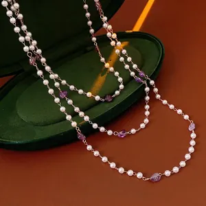 French vintage long necklace featuring white pearls and purple amethyst stone beads